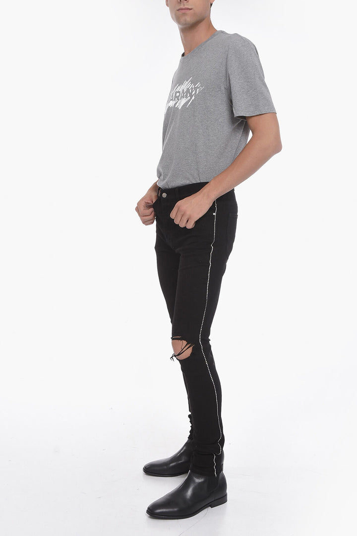 AMIRI STRETCHY SKINNY DENIMS WITH CRYSTAL