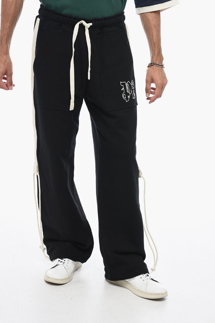 Pantaloni in cotone con coulisse e logo ricamato Palm Angels