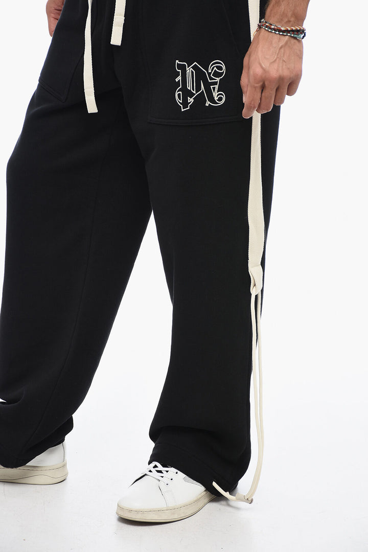 Pantaloni in cotone con coulisse e logo ricamato Palm Angels