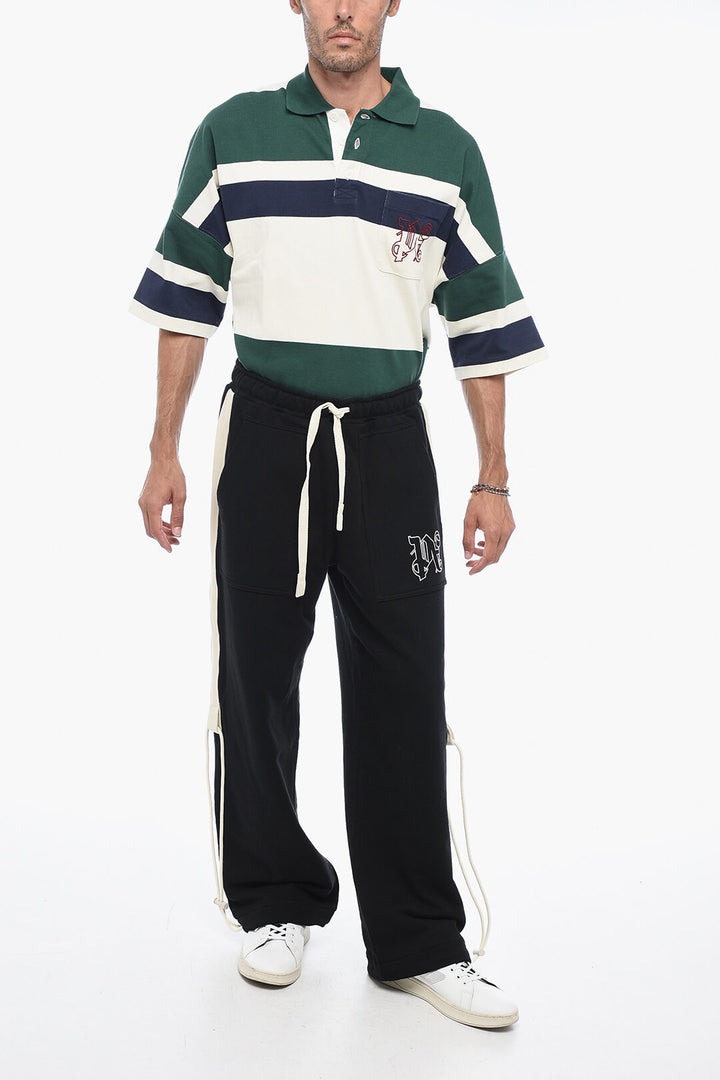 Pantaloni in cotone con coulisse e logo ricamato Palm Angels