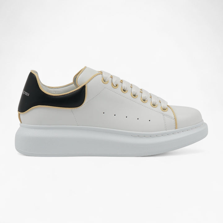 Sneakers Alexander McQueen bianche-nere-beige con suola in gomma oversize