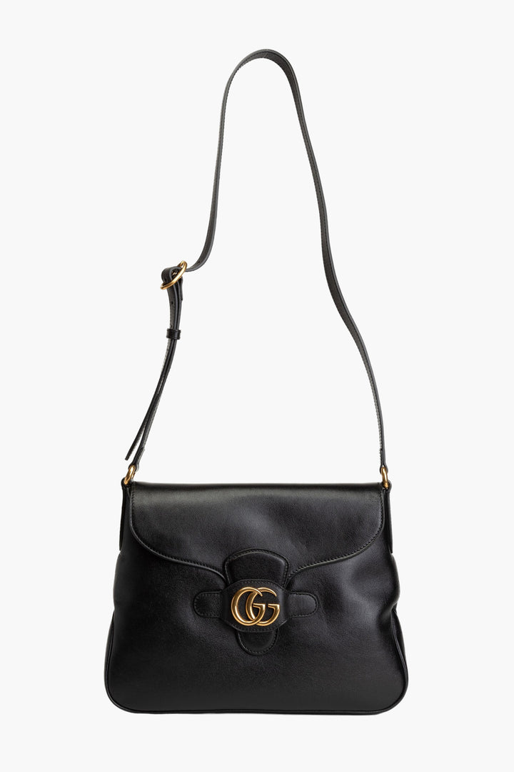 Borsa Gucci in pelle nera con iconico logo GG