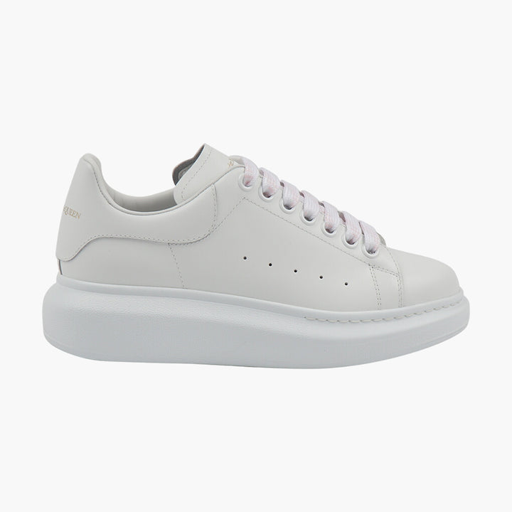 Sneakers in pelle bianca Alexander McQueen con suola esagerata