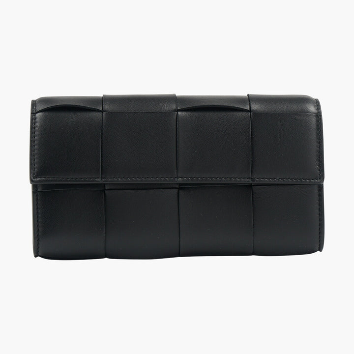 Portafoglio Bottega Veneta in pelle nera con iconico design intrecciato