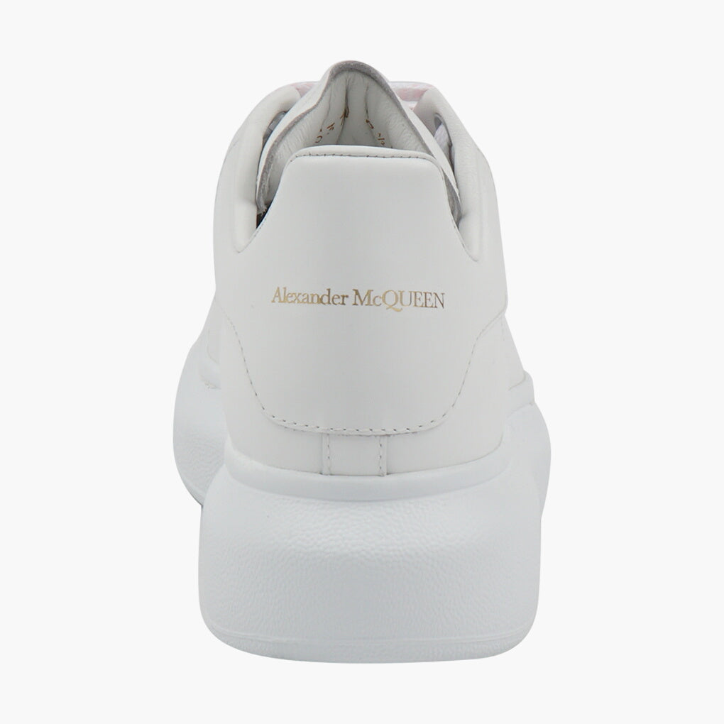 Sneakers in pelle bianca Alexander McQueen con suola esagerata