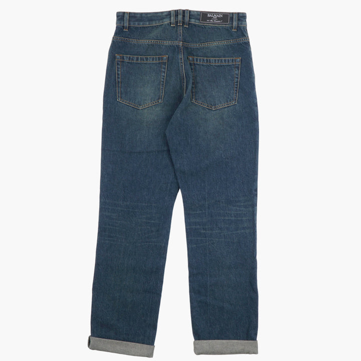 Jeans in denim BALMAIN - Vestibilità classica con leggera sbiaditura per un tocco moderno