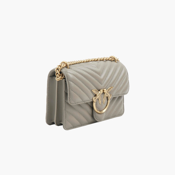 Borsa a tracolla trapuntata Pinko grigio-oro con tracolla a catena dorata e iconico logo dell'uccello