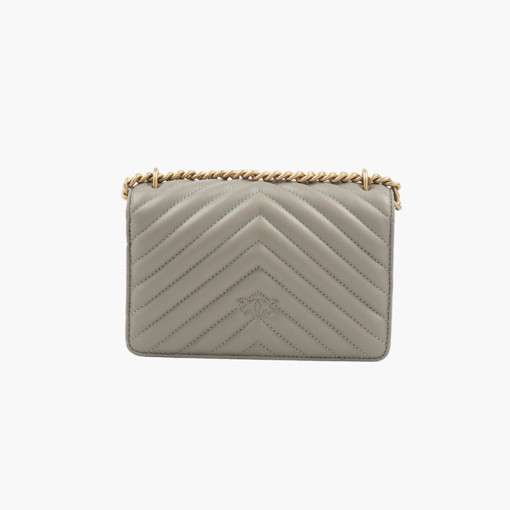 Borsa a tracolla trapuntata Pinko grigio-oro con tracolla a catena dorata e iconico logo dell'uccello