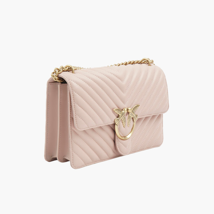 Borsa Pinko elegante trapuntata con decorazione a forma di uccello color oro in rosa-oro