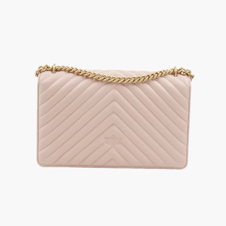 Borsa Pinko elegante trapuntata con decorazione a forma di uccello color oro in rosa-oro