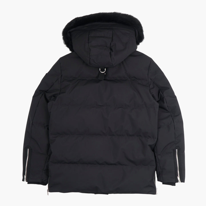 Cappotto in piumino con rifiniture in pelliccia nera di Moose Knuckles